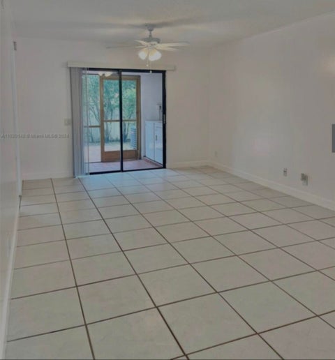 Tiny photo for 10581 ROYAL PALM Boulevard #10581, Coral Springs, FL 33065 (MLS # B26088164)