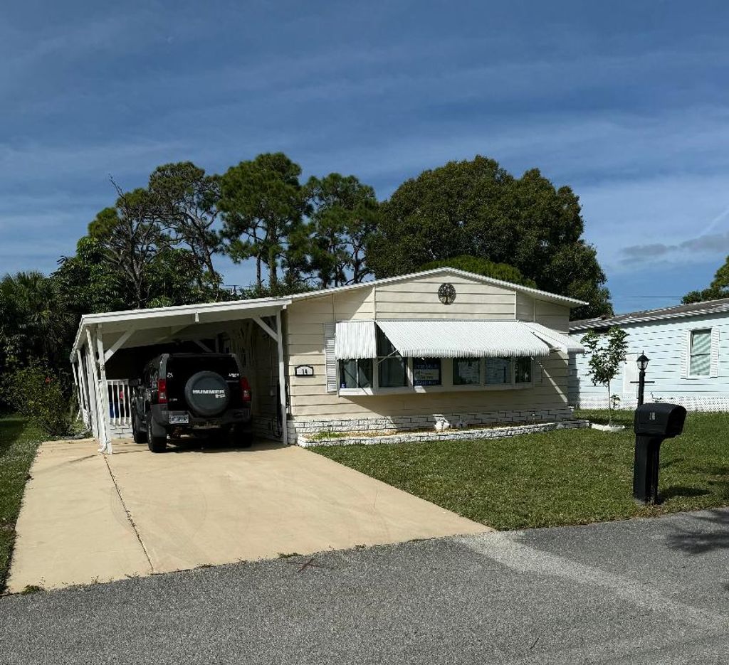 Photo of 14 Sierra Del Norte, Fort Pierce, FL 34951 (MLS # R11140001)