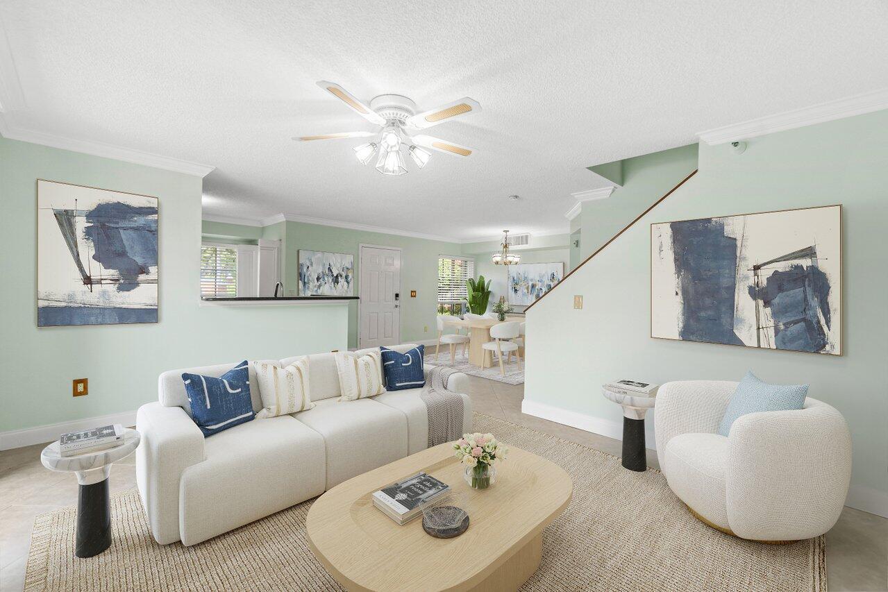 Seize the opportunity for an annual rental at a reduced price in the desirable waterfront community of 111 Yacht Club Way, Unit 101. This 3-bedroom, 2.5-bathroom townhome boasts 1,296 square feet, offering the largest floor plan available in the community. Enjoy the convenience of an assigned carport. The community features an impressive array of amenities, including two heated pools, a jacuzzi, a fitness center, a movie theater, a business center, and a clubhouse, all set within 23 acres of lush tropical landscaping. Rent includes water, cable, and fiber optic WiFi, (tenants responsible for electricity and renter's insurance). Immerse yourself in a vibrant lifestyle with unparalleled amenities in a secure, gated waterfront community. Don't miss out on this exceptional rental opportunity.