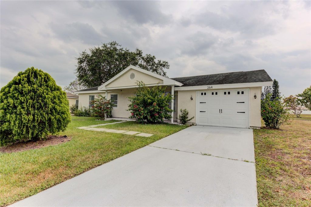 Photo of 264 SW Cherryhill Road, Port Saint Lucie, FL 34953 (MLS # F10433885)