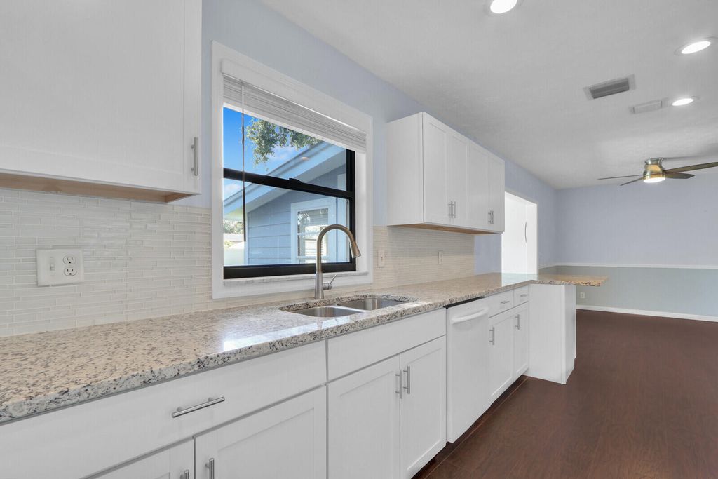 Photo of 5639 SE Indigo Avenue, Stuart, FL 34997 (MLS # R10996552)