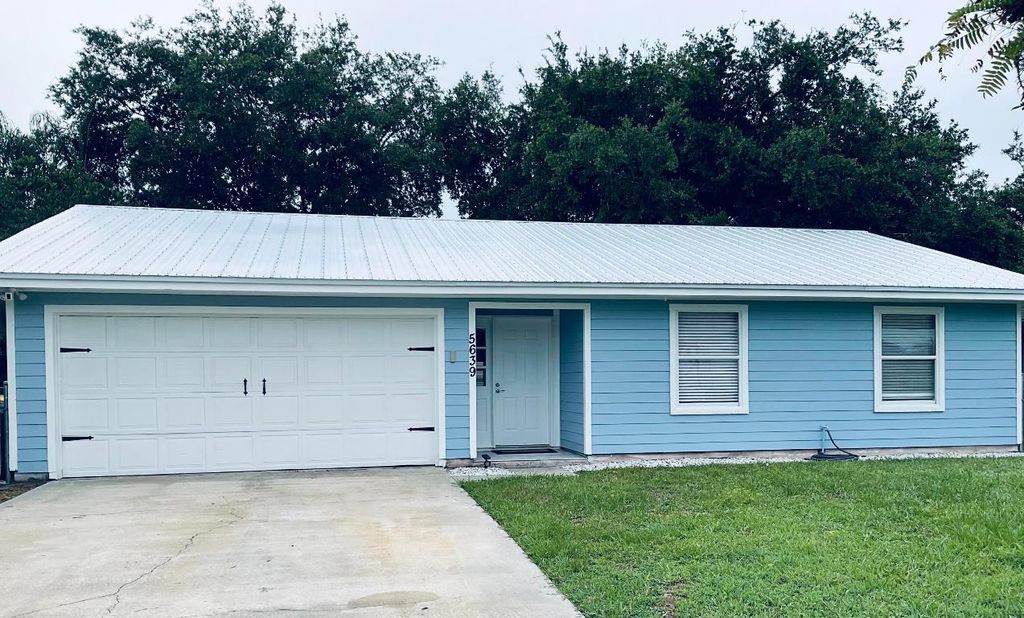 Photo of 5639 SE Indigo Avenue, Stuart, FL 34997 (MLS # R10996552)