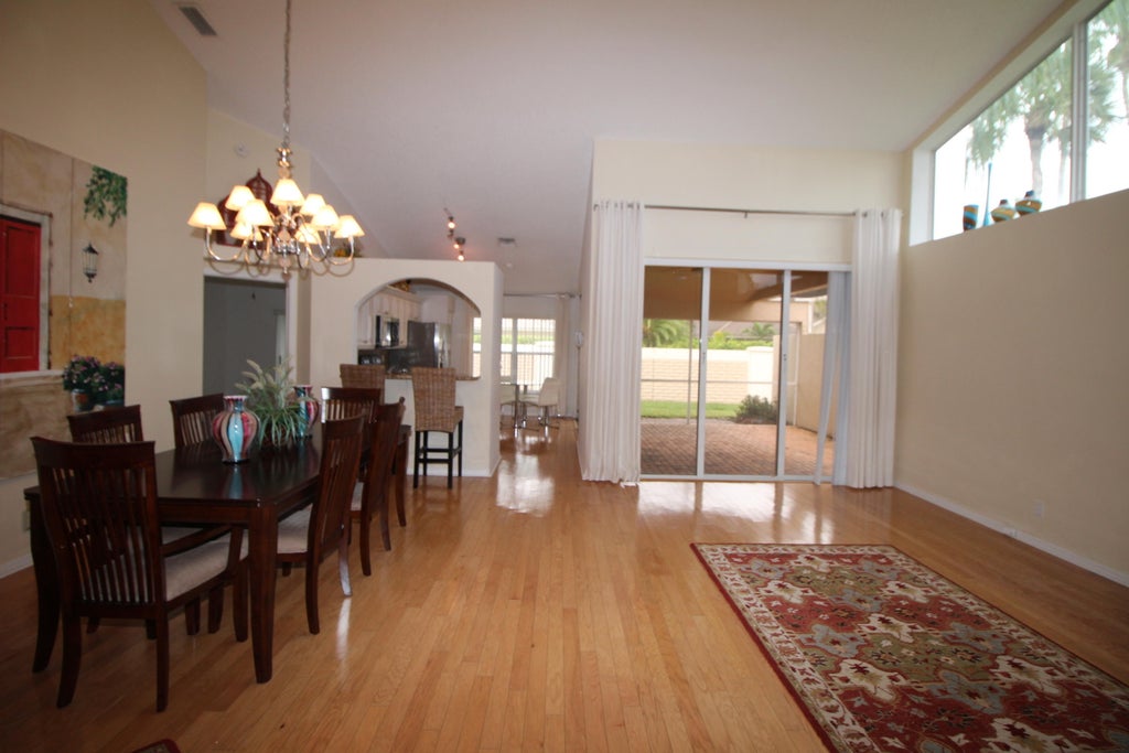 Photo of 404 Sabal Palm Lane, Palm Beach Gardens, FL 33418 (MLS # B26079982)