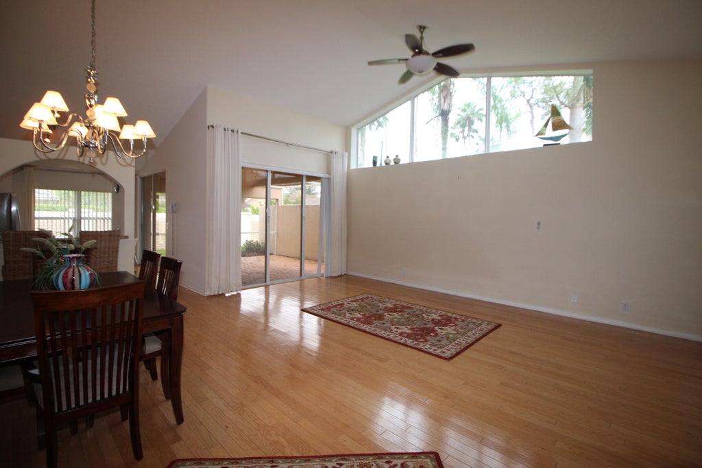 Photo of 404 Sabal Palm Lane, Palm Beach Gardens, FL 33418 (MLS # B26079982)