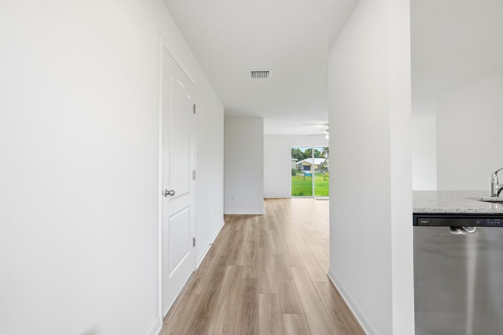 Photo of 375 SW Dwight Avenue, Port Saint Lucie, FL 34983 (MLS # B26034467)