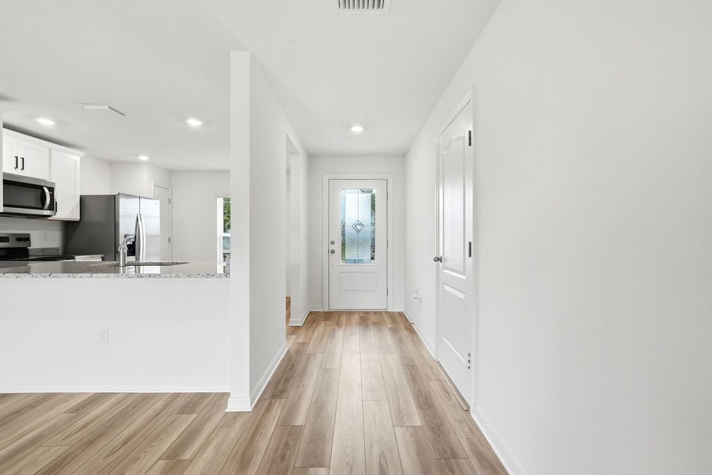 Photo of 375 SW Dwight Avenue, Port Saint Lucie, FL 34983 (MLS # B26034467)