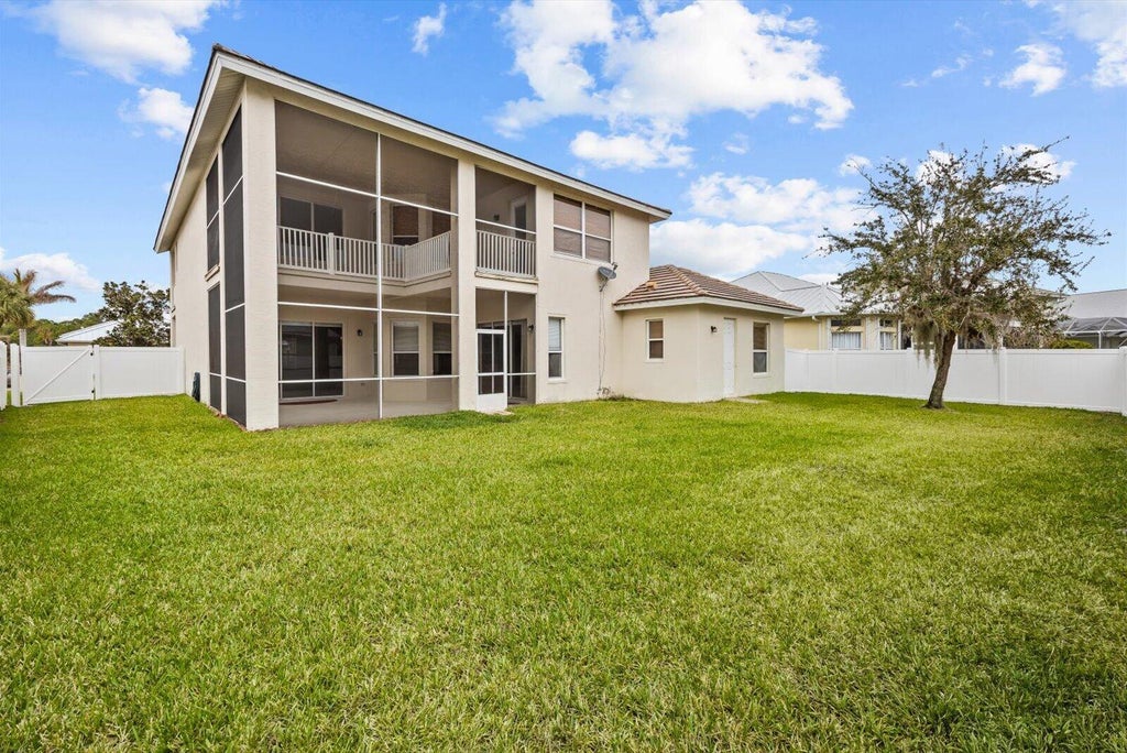Photo of 206 NW Magnolia Lakes Boulevard, Port Saint Lucie, FL 34986 (MLS # B26069936)