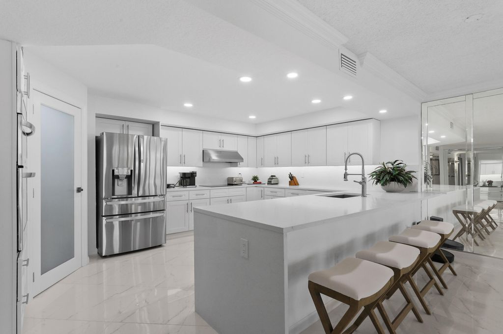 Photo of 3546 S Ocean Boulevard #424, South Palm Beach, FL 33480 (MLS # R10976111)