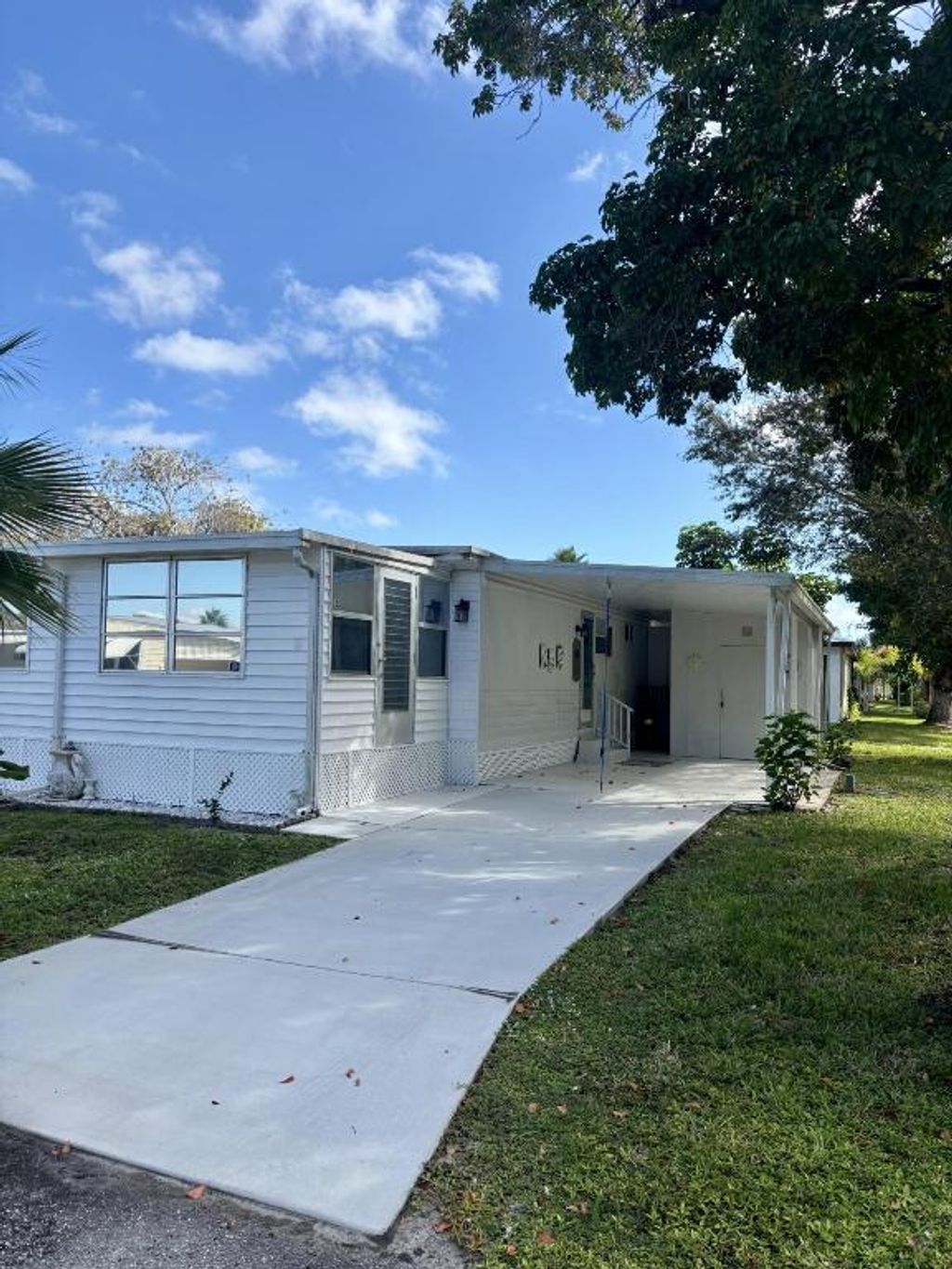 Photo of 2 Jasmine Lane, Port Saint Lucie, FL 34952 (MLS # R11146466)