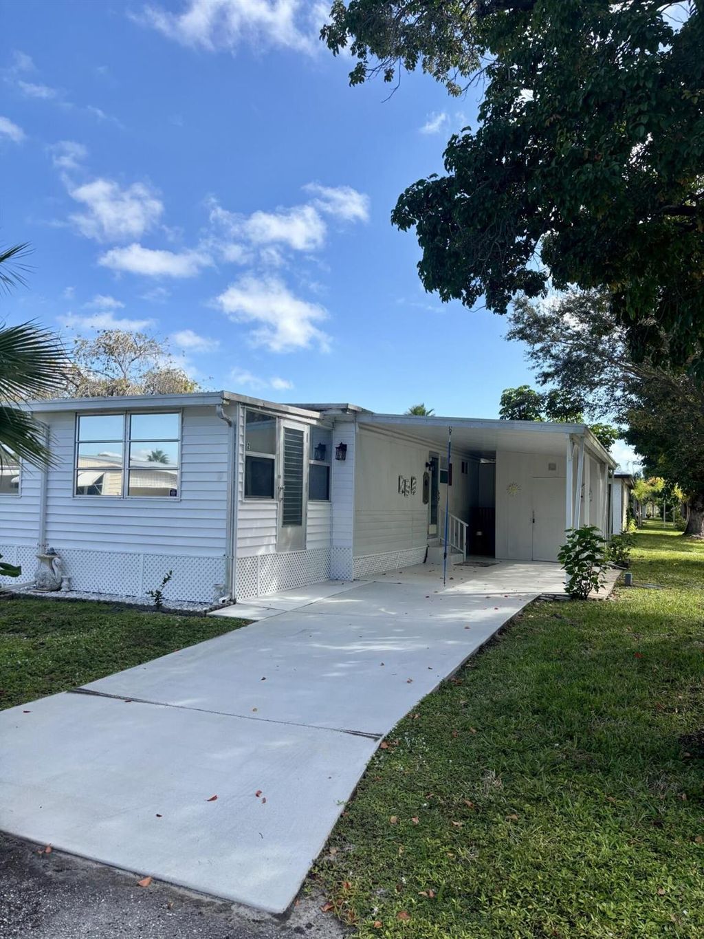 Photo of 2 Jasmine Lane, Port Saint Lucie, FL 34952 (MLS # R11146466)