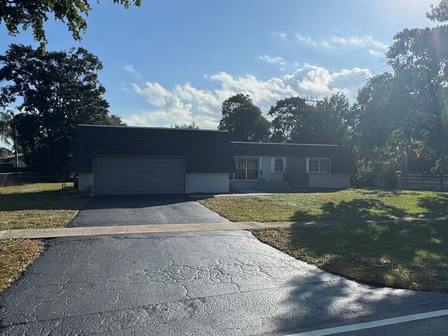 "FOR RENT": REMODELED 3 BEDROOM/2 BATHROOM/2 CAR GARAGE HOME IN A GREAT AREA OF PLANTATION. NEW KITCHEN, NEW APPLIANCES INCLUDING WASHER/DRYER, NEW BATHROOMS, FRESH PAINT, NEW TILE (NO CARPET AT ALL) AND A NEW A/C, NEWER WATER HEATER, LOTS OF LIVING AREA IN THIS HOUSE. LARGE FENCED YARD WITH 1/4 ACRE OF LAND. ROOM FOR THE KIDS TO PLAY. LIVING ROOM, DINING ROOM AND A FAMILY ROOM. LARGE PATIO. LARGE 2 CAR GARAGE. CLOSE TO SHOPPING, HIGHWAYS AND SCHOOLS. PARKS ARE 2 MINUTES AWAY. GREAT SCHOOLS - APPROVAL WITHIN 48 HOURS. - NEW ROOF BEING INSTALLED.