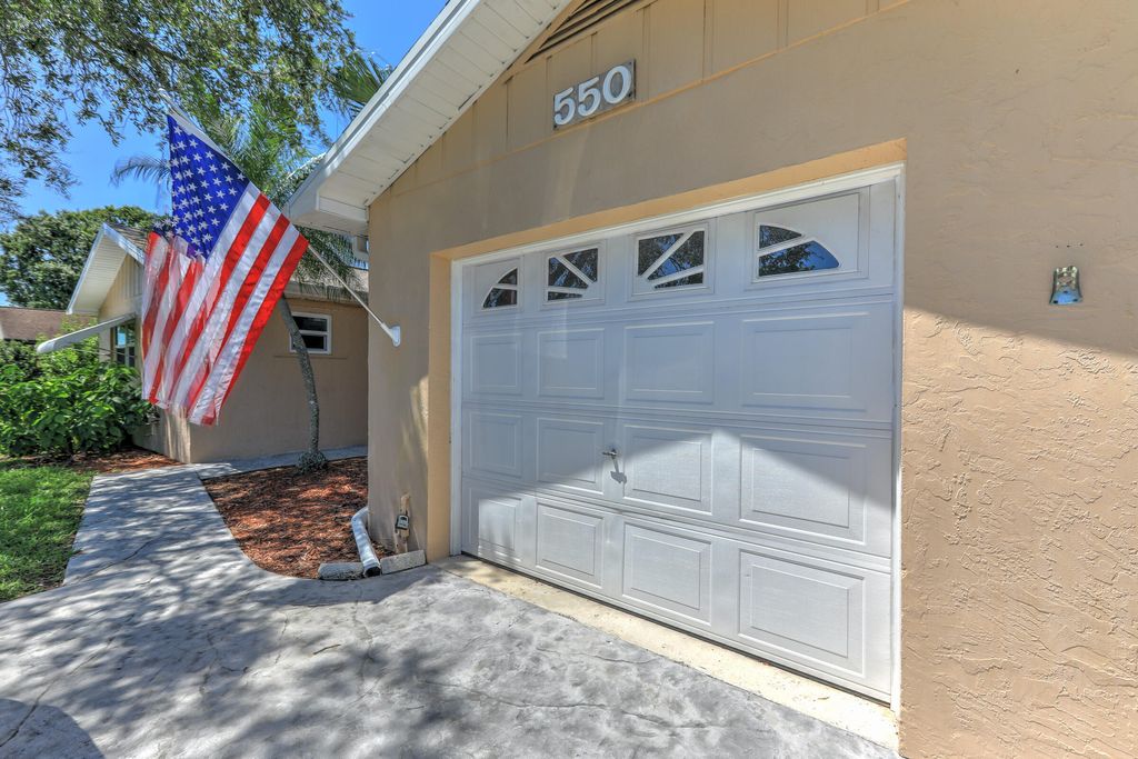 Photo of 550 SE Anchor Lane, Port Saint Lucie, FL 34983 (MLS # R10992601)