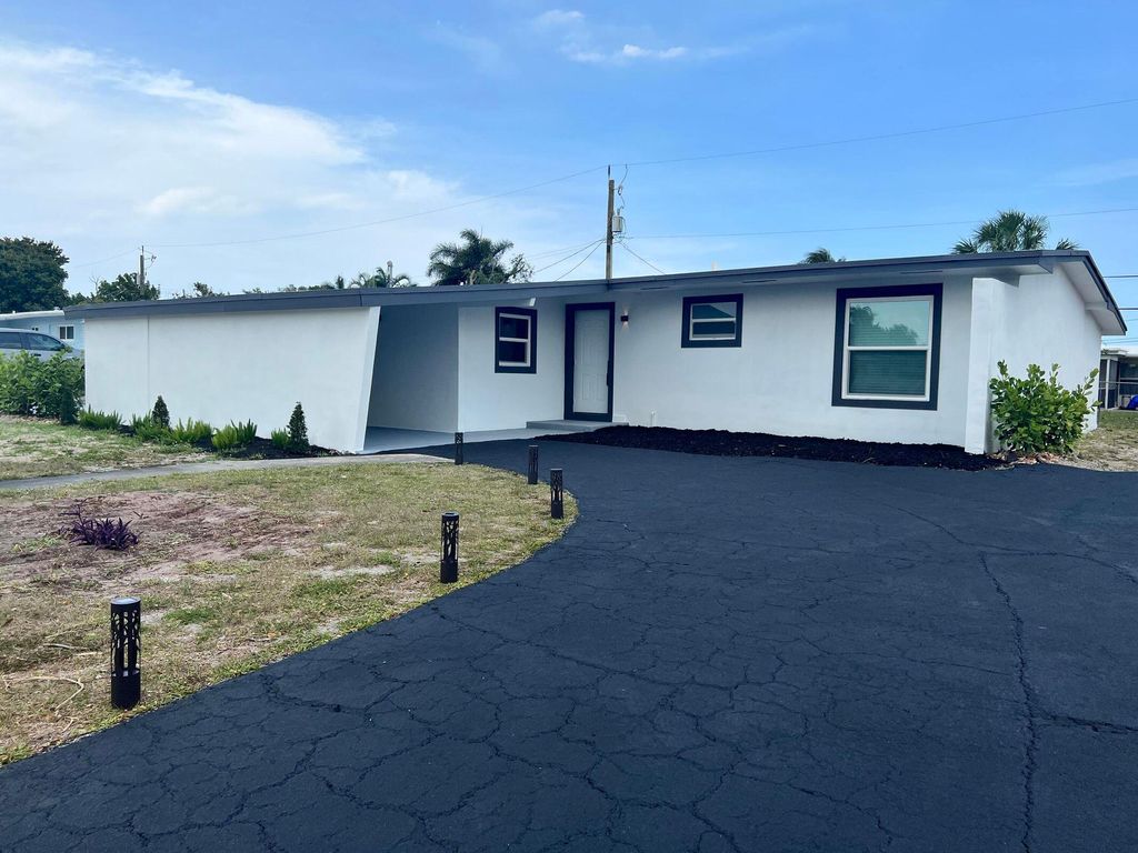 Photo of 132 Davis Road Rd, Palm Springs, FL 33461 (MLS # R10792975)