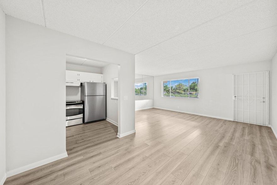 BEST VALUE IN THE NEIGHBORHOOD! Completely remodeled unit! Step into this beautifully renovated second-floor condo and experience modern comfort at its best. This 1-bedroom, 1-bathroom condo has been completely updated from top to bottom and features brand-new flooring along with updated appliances. The private balcony offers a serene garden view, perfect for relaxing outdoors. Located in a highly desirable 55+ community just minutes from PBI Airport, I-95, top restaurants, shops, and the beach, this condo offers the perfect blend of convenience and lifestyle. Whether you're looking for a full-time Florida retreat or an income-generating investment, this property fits the bill. With no rental restrictions, it's truly investor-friendly. Residents enjoy access full amenities including a recently up including a recently upgraded elevator system, a gated pool with lounge areas, a clubhouse with men's and women's saunas, a fitness center, billiards, a reading room, a dance floor, and a relaxing lounge. There's even a putting green and plenty of community activities to enjoy. Don't miss the opportunity to own a fully renovated condo in one of Palm Beach County's most convenient and active communities.