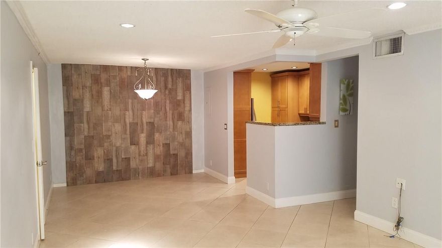 Rarely Available ground floor Dock Side 2/2 Corner unit with Canal View in the exclusive Bay Colony Club community! 24 hour guarded & gated. Very quite Impact windows & New Patio door to a new screened-in porch. Custom Kitchen with upscale stainless appliances & Granite counters + In-suite Washer/Dryer. Beautiful crown moldings. Low condo fees + boat dockage up to 50 ft. @ only $1.50/foot/month=cheep. Wonderful location along the Intracostal, Near great shopping, restaurants, hospitals etc. Must see!