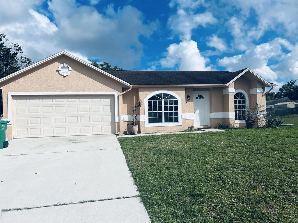 Photo of 4271 SW Bachman Street SW, Port Saint Lucie, FL 34953 (MLS # R11036888)