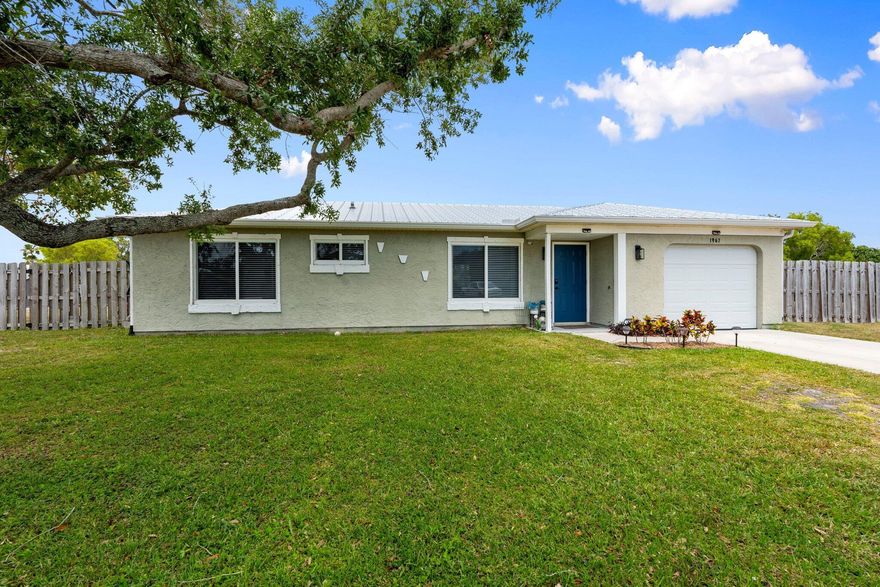 Immaculate CBS 2/2/1 and truly move-in ready. Every inch has been upgraded, no punch list, no projects & no surprises. Brand new roof, new AC, and PGT impact windows throughout! The massive fully fenced backyard is made for entertaining, pets and play. Conveniently located near shopping, minutes to Jensen Beach and quick access to major highways. Clean, solid, updated and easy. This one checks every box