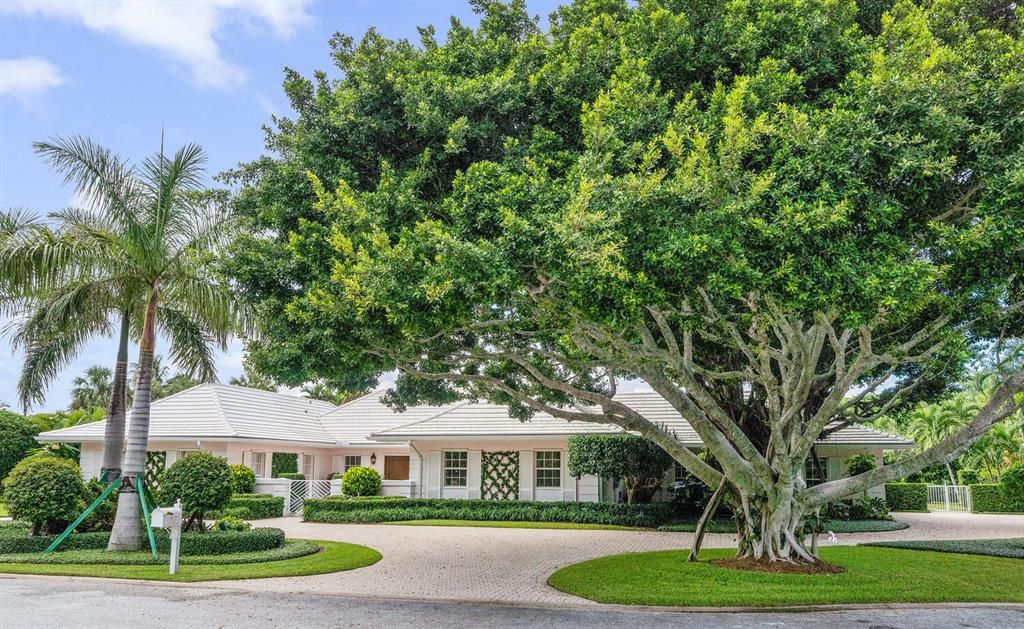 Photo of 12105 Surrey Lane, North Palm Beach, FL 33408 (MLS # R10762409)