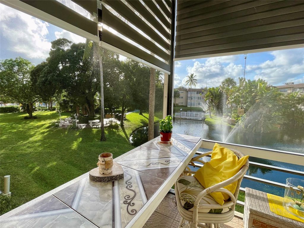 Photo of 5071 W Oakland Park Boulevard #211, Lauderdale Lakes, FL 33313 (MLS # F10535406)