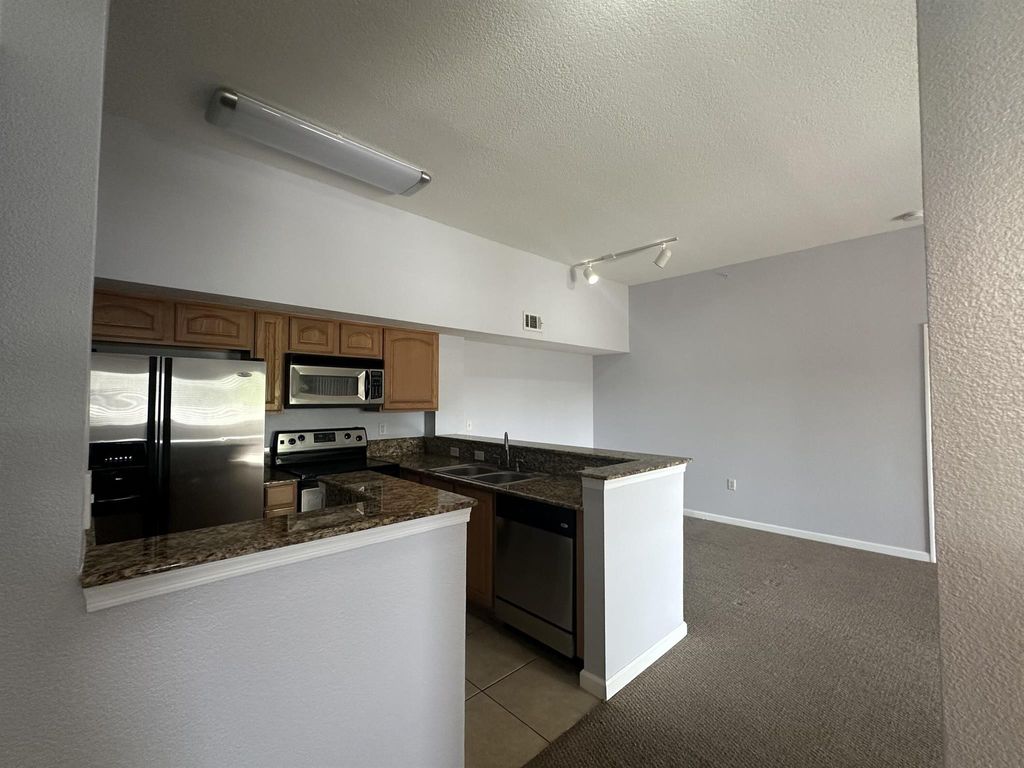 Photo of 211 SW Palm Drive #305, Port Saint Lucie, FL 34986 (MLS # R10973705)