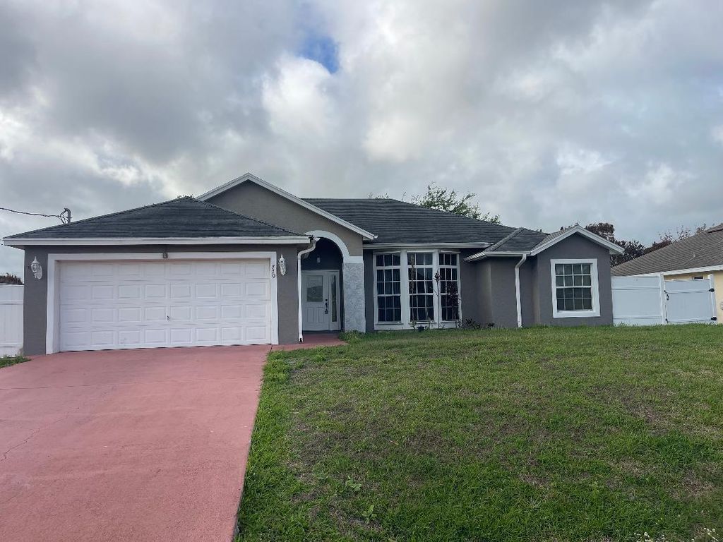 Photo of 770 SW Jordin Avenue, Port Saint Lucie, FL 34953 (MLS # R11164340)