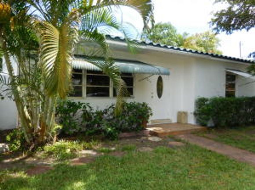 VERY NICE 3 BEDROOM CBS HOME WITH S TILE ROOF. LOVELY WOOD FLOORING, LARGE KITCHEN, LARGE FAMILY ROOM, OR DINNING ROOM. BONUS ROOM IN LAUNDRY AREA. GIANT CARPORT FOR SMALL BOATS, CARS, JET-SKIS, CAMPERS. SEE PICTURES. NEWER A/C AIR HANDLER. WALK TO PALMETTO ELEMENTARY AND FOREST HILL HIGH. MINUTES TO BEACHES, CITY PLACE,AND THE OUTLET MALL. THE FIREPLACE IS NOT WORKING. ALL FIGURES ARE APPROXIMATE.