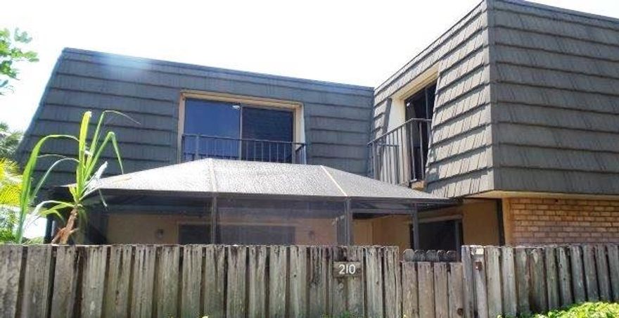 Conveniently located townhome with over 1,200 square feet of living space.  The property provides a kitchen with backsplash, tiled floors, 2 bedrooms, 3 bathrooms, and a covered patio.  The property backs up to a canal. Quick access to I-95, Keiser University, shopping centers, and  more.