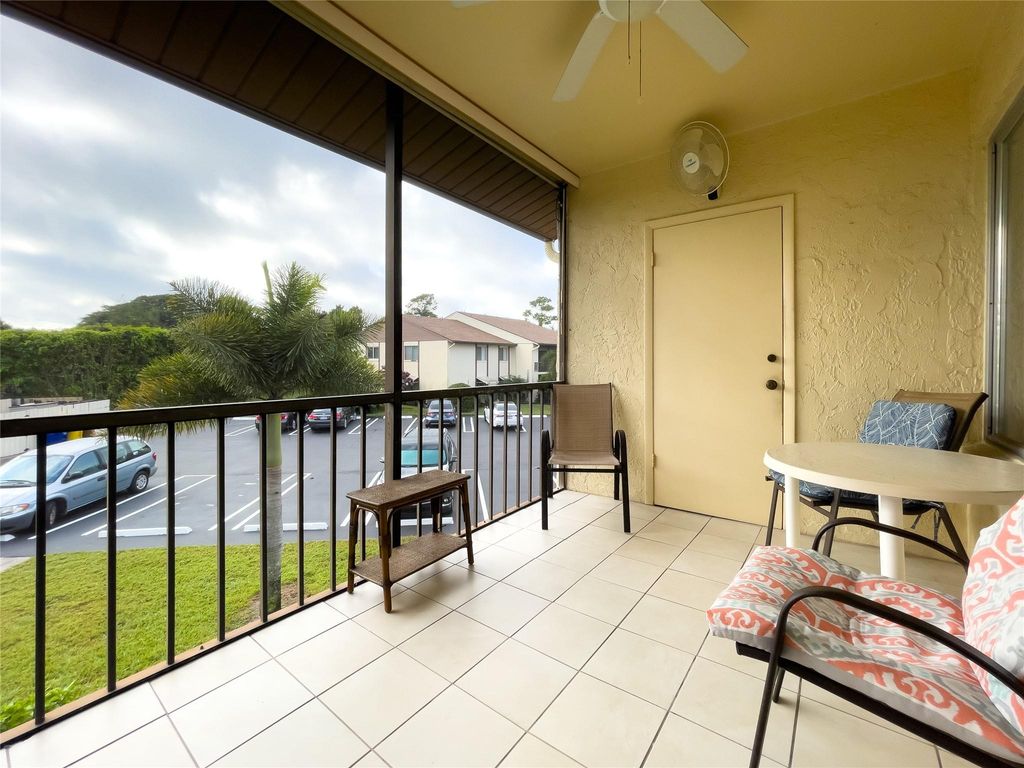 Photo of 317 Knotty Pine Circle #C2, Greenacres, FL 33463 (MLS # F10500603)