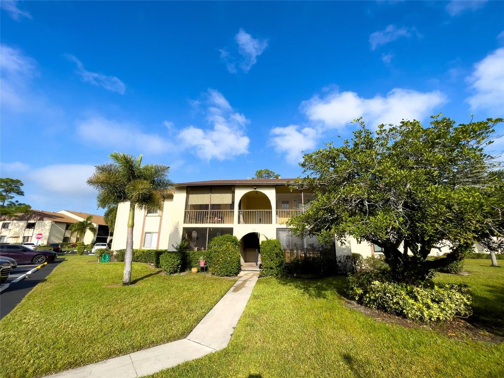 Photo of 317 Knotty Pine Circle #C2, Greenacres, FL 33463 (MLS # F10500603)