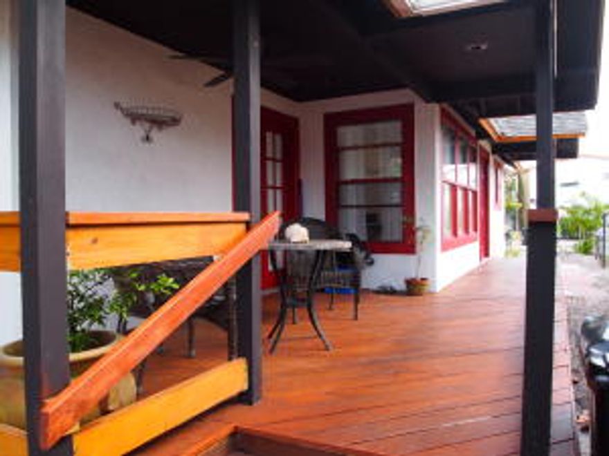 Charming 1/1 Lake Worth Cottage Style home with Den/Office right in the Heart of the City.  Eight foot ceilings and open floor plan present a spacious, comfortable feel. Relax outside on the southern exposed patio overlooking xeriscaped surroundings.  13' x 11' CBS Storage Outbuilding with Laundry. Large Fenced-In Backyard with Off-Street Parking. Desirable location-Steps from Downtown shops, restaurants and events.