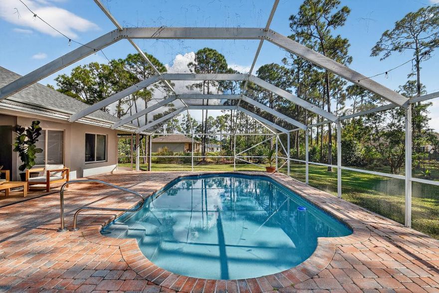 AN EXCEPTIONAL HOME LIKE THIS IS A RARE RENTAL FIND.Beautiful 3 bedroom, 2 bath home with 2 car garage on 1.15 acres, fully fenced and pet friendly. Stunning outdoor space features a screened pool and paved patio, perfect for entertaining. Open floor plan with abundant natural light, spacious kitchen with ample cabinets and breakfast area, separate dining room, large family and living rooms. Primary suite overlooks the pool, with 2 walk-in closets and an updated bathroom with dual sinks, jetted tub, and huge shower. Extra outdoor storage completes this exceptional rental.Perfect for families and pets to enjoy a comfortable, relaxed lifestyle.Your perfect rental awaits. DON'T MISS OUT !!