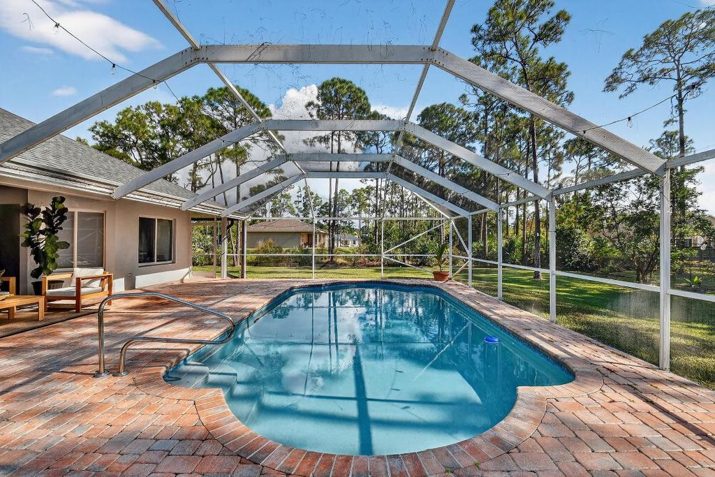 Photo of 13462 Key Lime Boulevard, West Palm Beach, FL 33412 (MLS # R11151791)