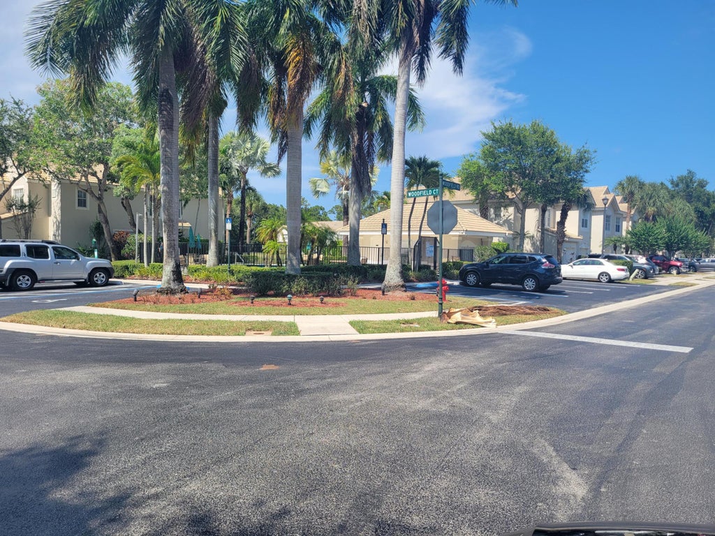 Photo of 1042 Woodfield Road, Greenacres, FL 33415 (MLS # B26068068)