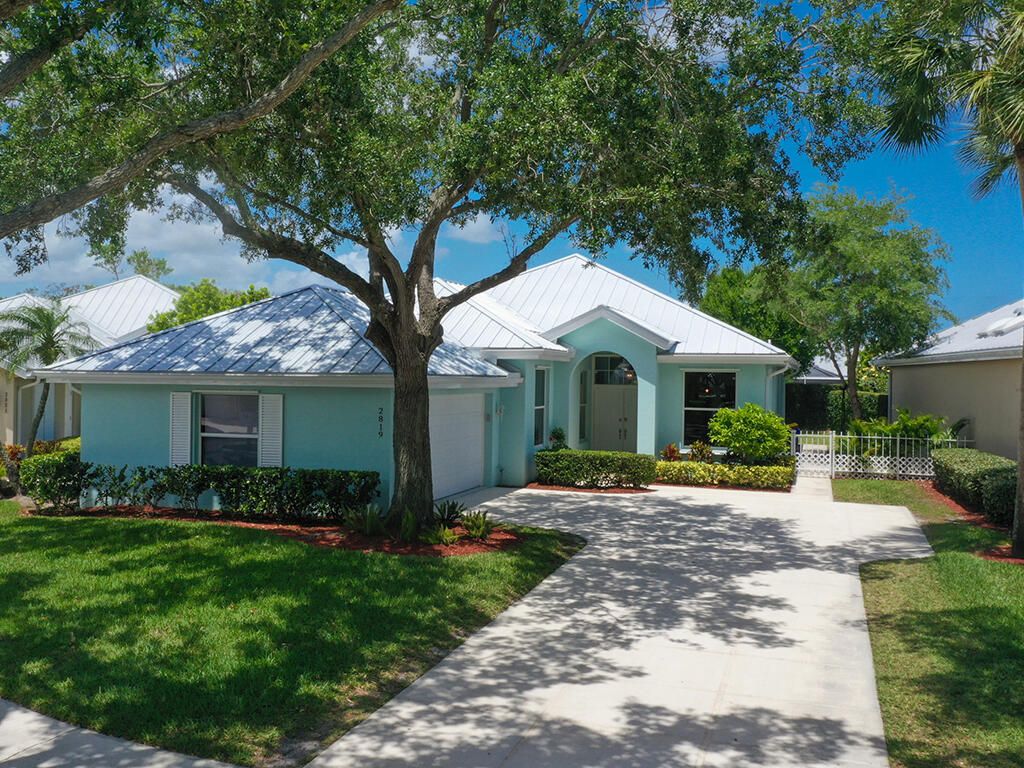 Photo of 2819 SW Brighton Way, Palm City, FL 34990 (MLS # R10794176)