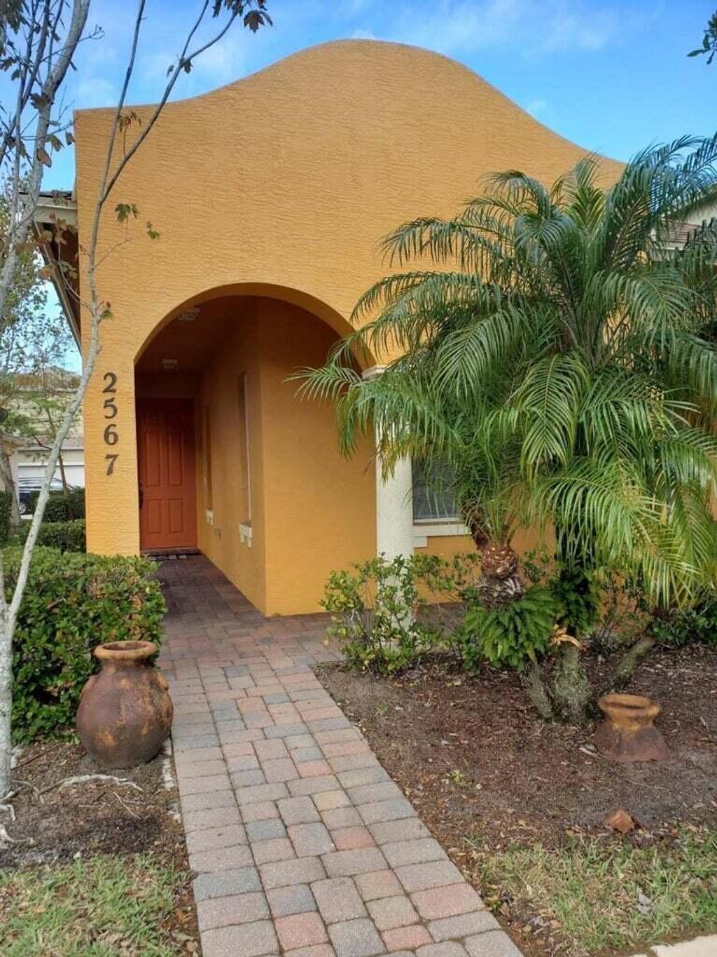 Photo of 2567 SE Ruskin Drive, Port Saint Lucie, FL 34952 (MLS # R10994577)