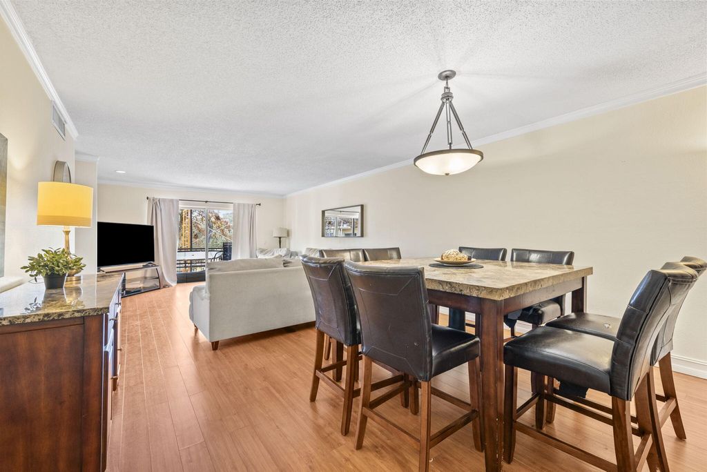 Photo of 6300 S Falls Circle Drive #311, Lauderhill, FL 33319 (MLS # B26002363)