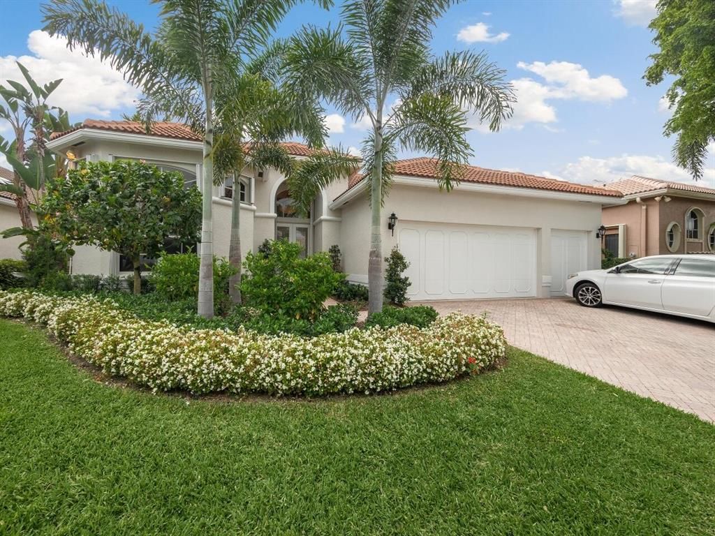 Photo of 148 Banyan Isle Drive, Palm Beach Gardens, FL 33418 (MLS # R10711571)