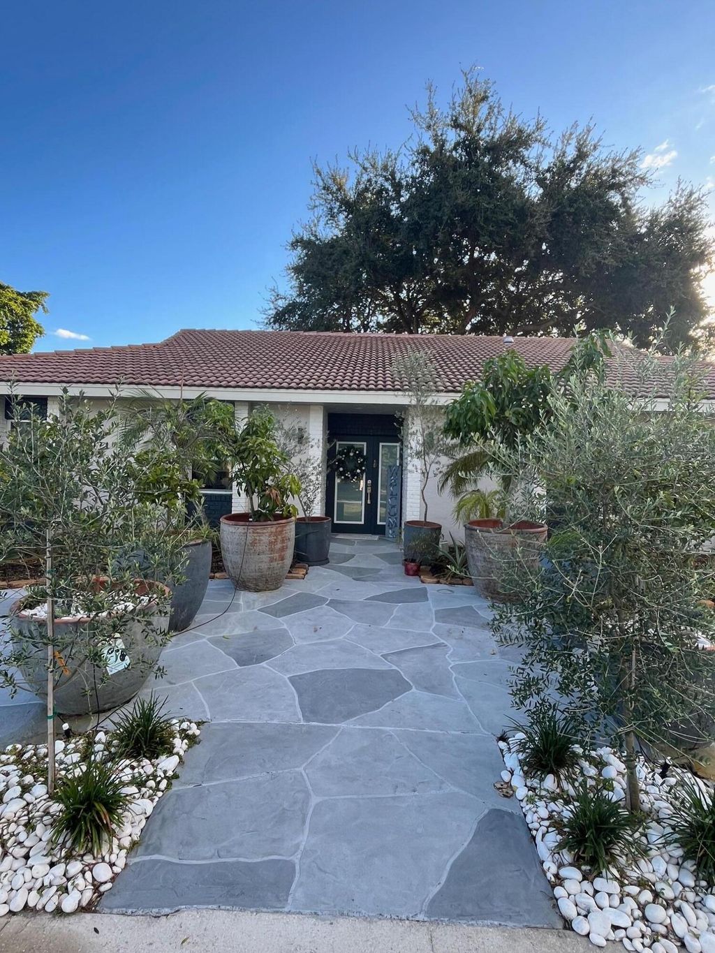 Photo of 7598 W Country Club Boulevard, Boca Raton, FL 33487 (MLS # R11141542)