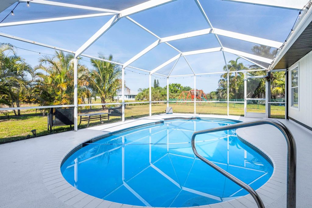 Photo of 601 SW Icon Avenue, Port Saint Lucie, FL 34953 (MLS # B26019528)