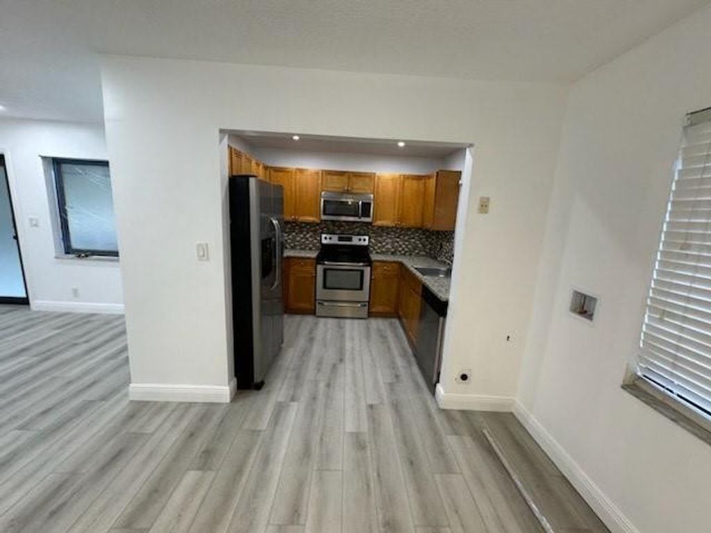 Photo of 11660 NW 45th Street #3, Coral Springs, FL 33065 (MLS # F10511995)