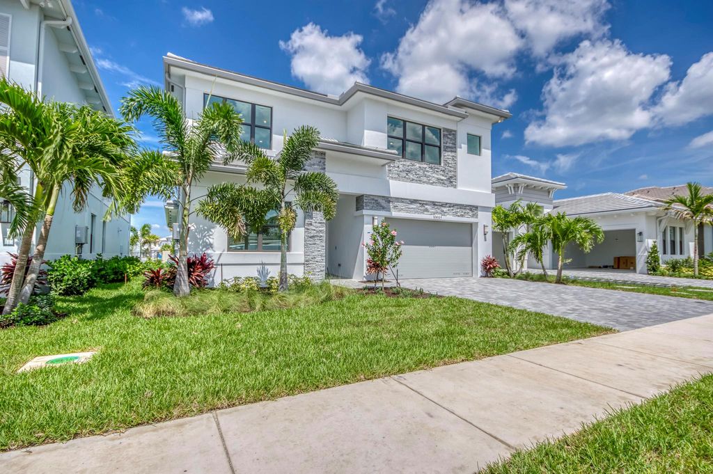 Photo of 10037 Heron Flock Drive, Palm Beach Gardens, FL 33412 (MLS # R11047349)