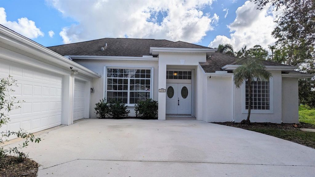 Photo of 1990 SW Justison Avenue, Port Saint Lucie, FL 34953 (MLS # R10933173)