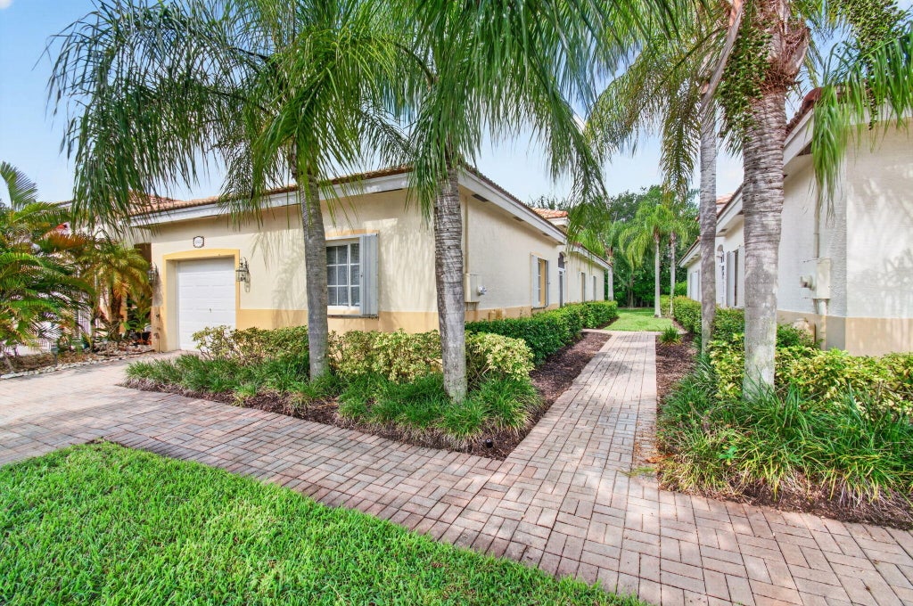 Photo of 2323 WINDJAMMER Way, West Palm Beach, FL 33411 (MLS # B26062000)