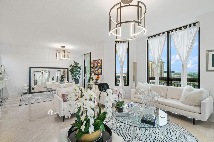 This 3 Bedroom & 2.5 Bathroom luxury corner condo boasts breathtaking panoramic skyline & sunset views over Clear Lake! Dramatic floor-to-ceiling windows, high ceilings, dedicated foyer, full-size upgraded laundry room, and parking on low ''M'' level are just a few of the features that separates this spacious 1858sqft luxury condo. In addition, hardwood, marble & tile flooring throughout, incredible closet space, crown-molding, tray ceilings, light granite counters in gourmet kitchen. Fully furnished turnkey with stunning finishes to truly enjoy your summer season in luxury. Located just moments from dining, shopping, nightlife, and cultural attractions, Two City Plaza offers full-service, resort-style amenities in one of downtown's most desirable addresses. Amenities in this full-service building are endless; 24-hr security, concierge, roof top pool, hot tub, sauna, steam room, fully renovated state of the art fitness center/gym, outdoor kitchen w/ BBQ area and all NEW Restoration Hardware furniture, outdoor & indoor movie theaters, club room, table tennis, lanai courtyard w/ water feature, renovated roof top dog park area, complimentary valet parking & exceptional staff. Centrally located in the heart of Downtown West Palm Beach, across from One Flagler offices, 7 minutes to PBIA airport, award winning restaurants and shopping, and walking to Worth Ave, Palm Beach.