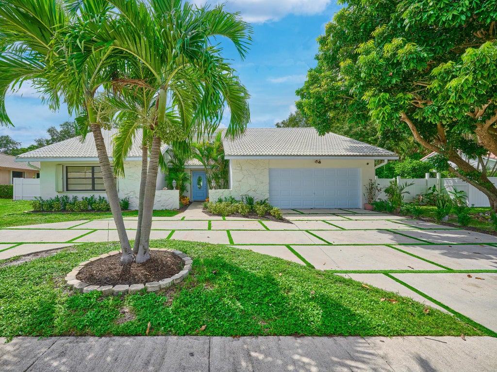 Photo of 410 NW 53RD Street, Boca Raton, FL 33487 (MLS # B26083289)
