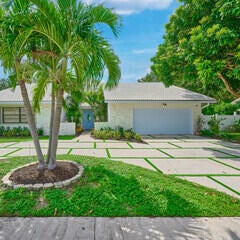 Photo of 410 NW 53RD Street, Boca Raton, FL 33487 (MLS # B26083289)
