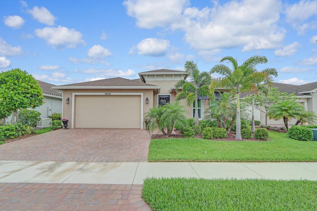 Photo of 10342 SW Ligustrum Drive, Port Saint Lucie, FL 34987 (MLS # R10986210)
