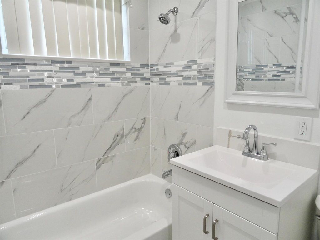 Photo of 465 Waseca Drive, Lake Worth, FL 33462 (MLS # R10987889)