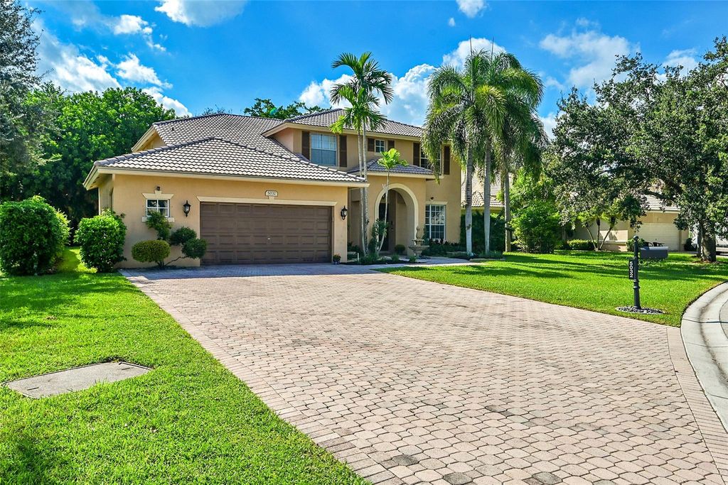 Photo of 5032 NW 57th Way, Coral Springs, FL 33067 (MLS # F10463940)
