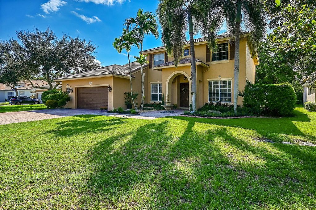 Photo of 5032 NW 57th Way, Coral Springs, FL 33067 (MLS # F10463940)